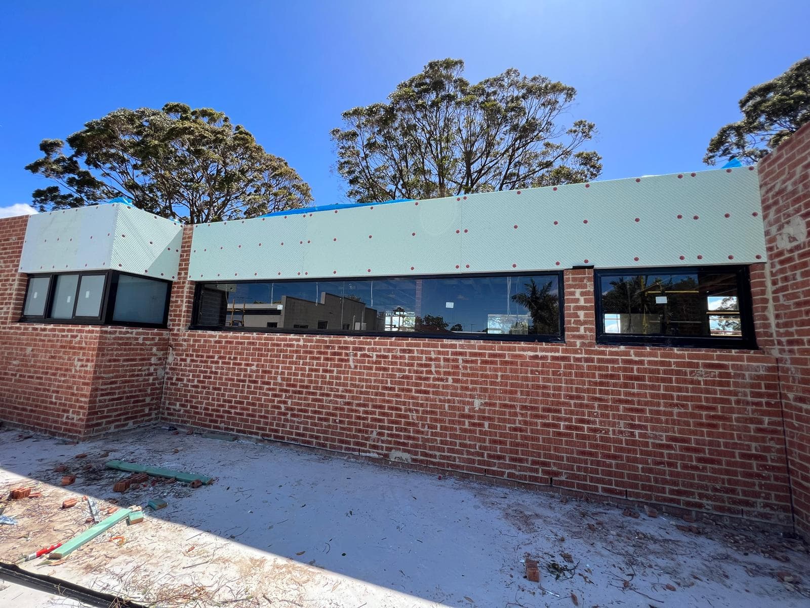 RAY Polystyrene Cladding team installing polystyrene foam cladding